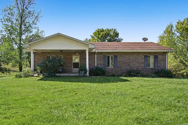 10.5 Acres of Land with Home for Sale in Hilham, Tennessee