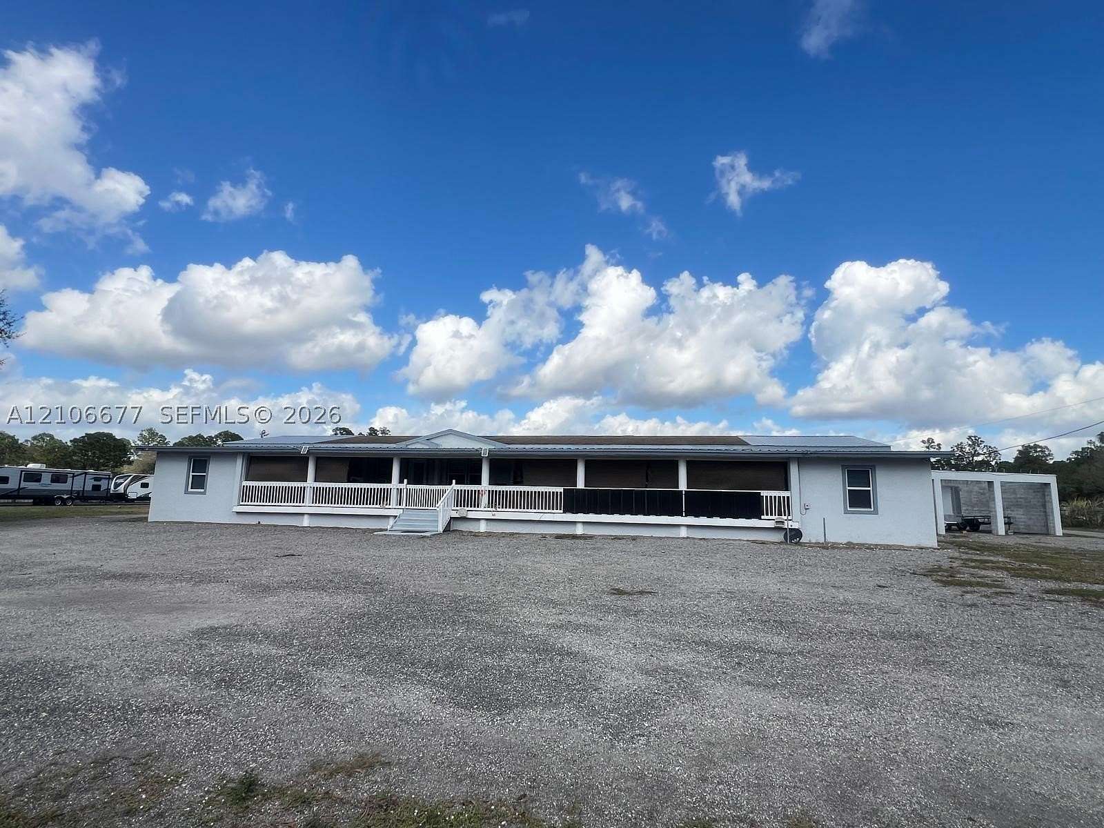 2.5 Acres of Land with Home for Sale in Clewiston, Florida