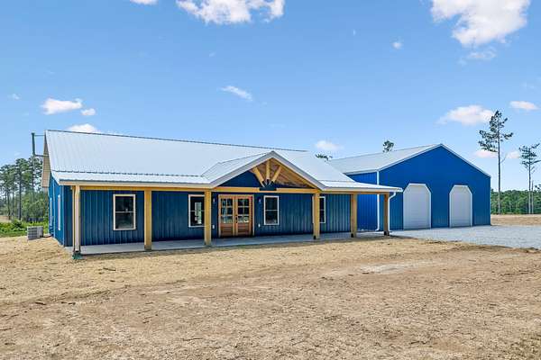 5.69 Acres of Land with Home for Sale in Hohenwald, Tennessee