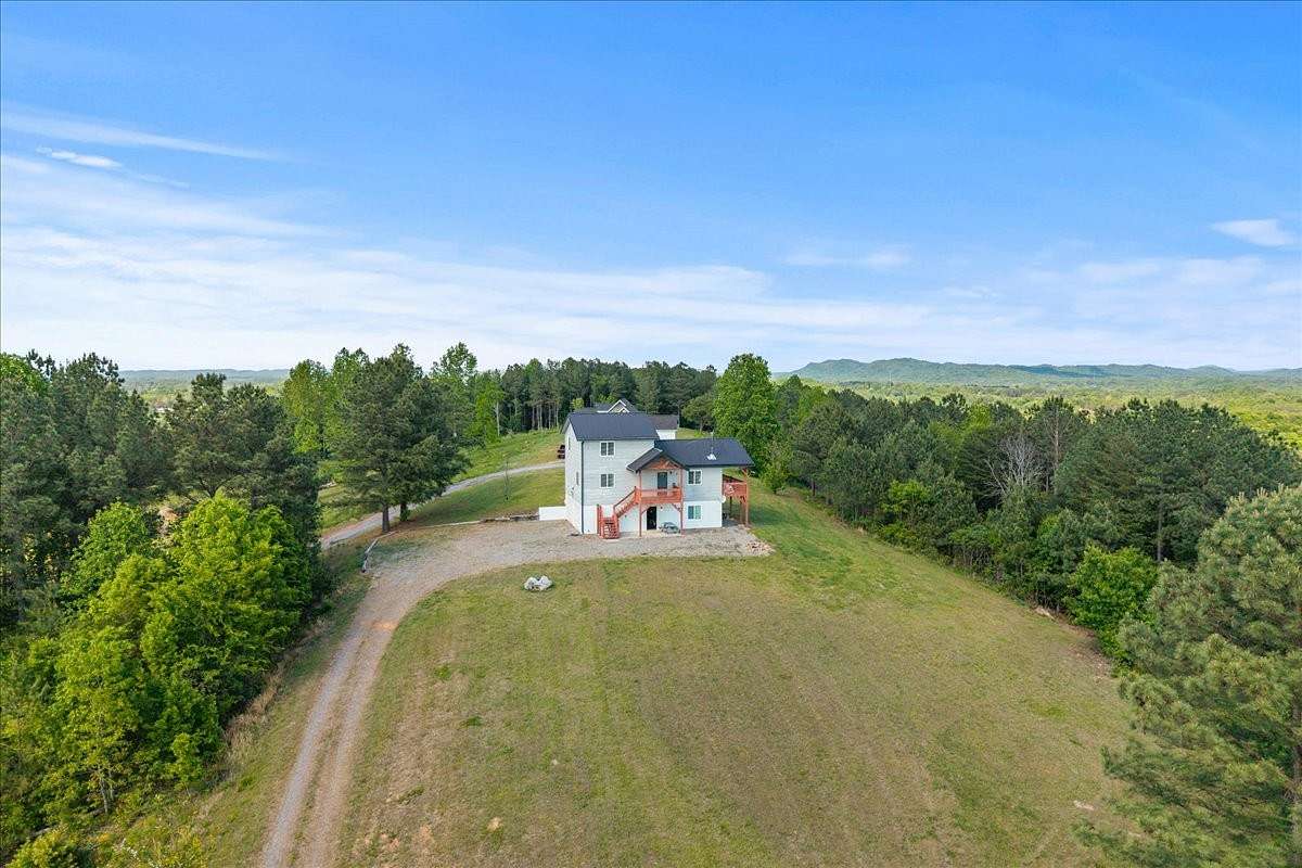 14.6 Acres of Land with Home for Sale in Etowah, Tennessee