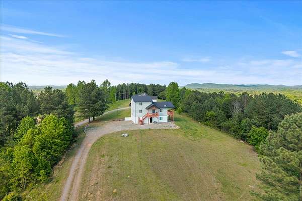 14.6 Acres of Land with Home for Sale in Etowah, Tennessee