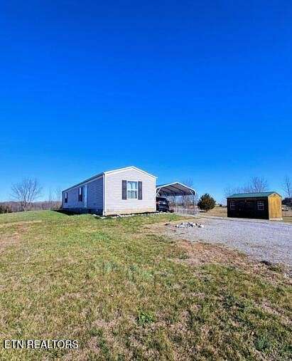 3.32 Acres of Land with Home for Sale in Madisonville, Tennessee