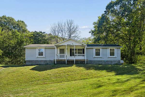 30.6 Acres of Recreational Land with Home for Sale in Watertown, Tennessee
