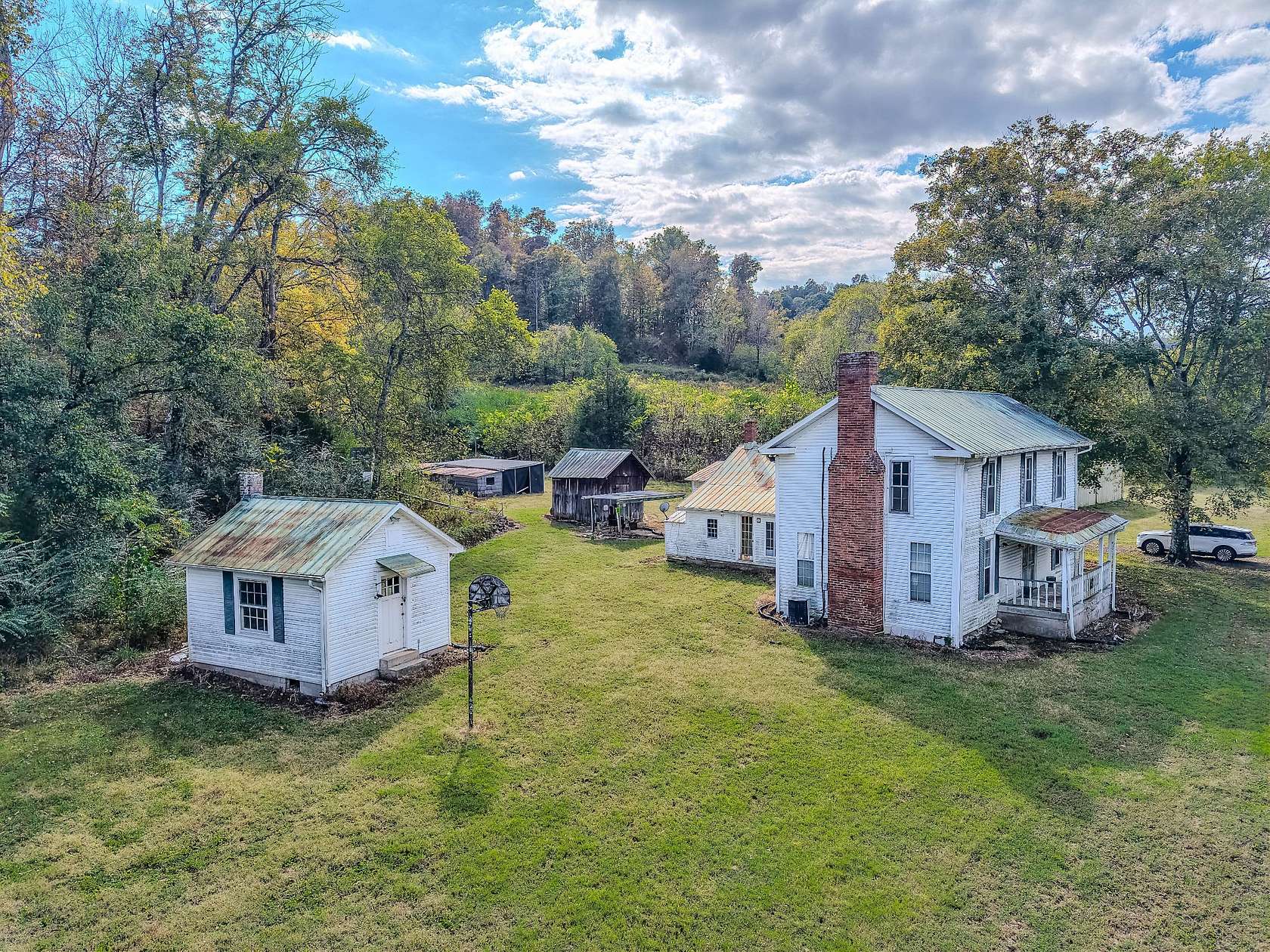 84.7 Acres of Recreational Land with Home for Sale in Lawrenceburg, Tennessee