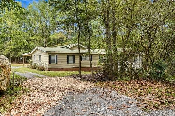 1.6 Acres of Land with Home for Sale in Silver Creek, Georgia
