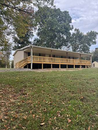 3.78 Acres of Land with Home for Sale in Red Boiling Springs, Tennessee