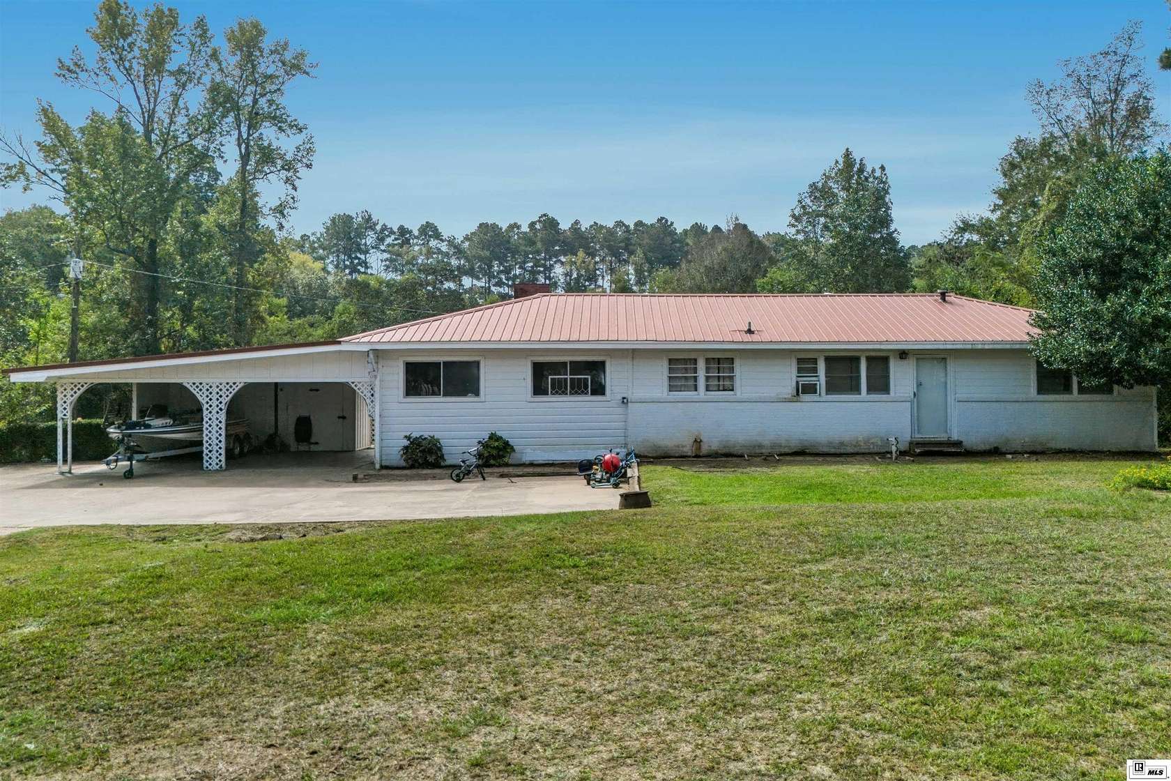 12.3 Acres of Land with Home for Sale in Chatham, Louisiana