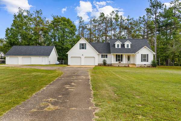 6.45 Acres of Land with Home for Sale in Counce, Tennessee