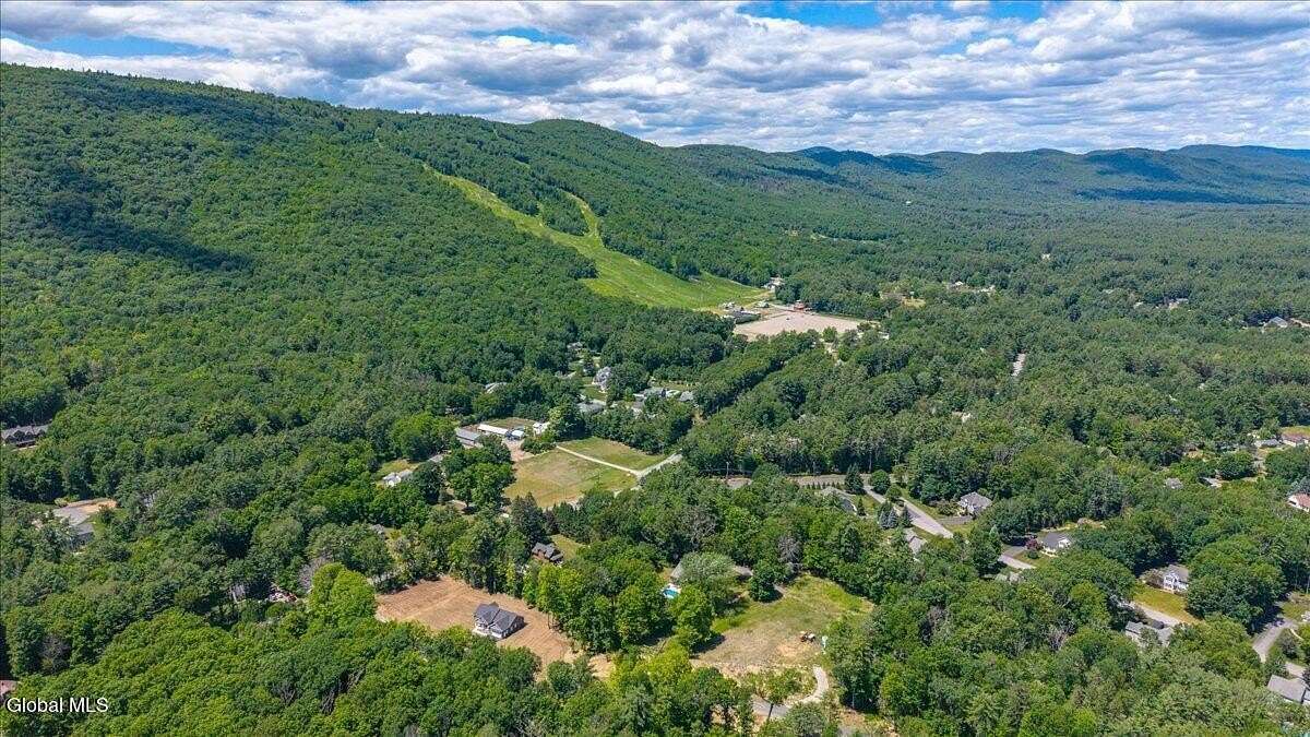 2.33 Acres of Land with Home for Sale in Queensbury, New York