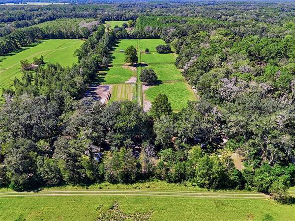 13.6 Acres of Land with Home for Sale in Alachua, Florida