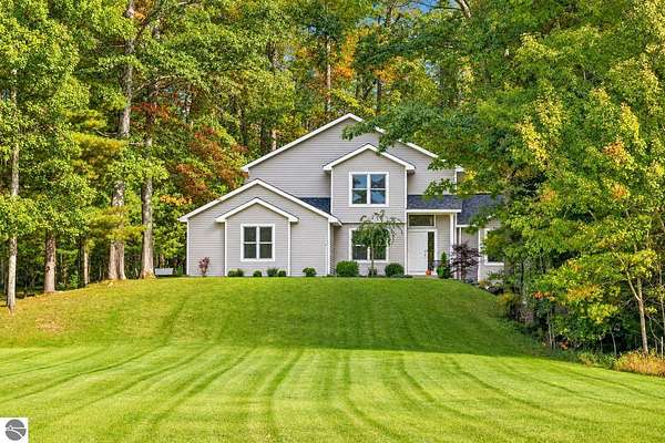 10 Acres of Land with Home for Sale in Williamsburg, Michigan