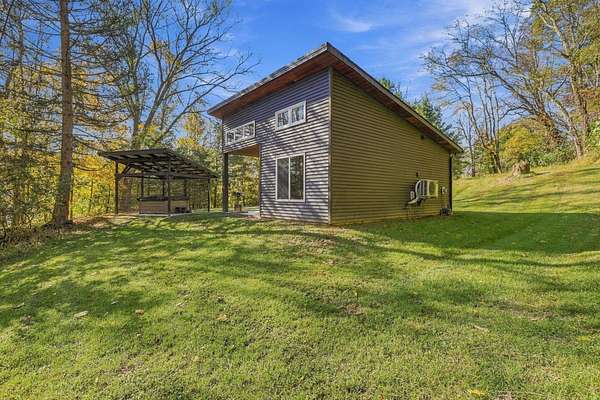 1.49 Acres of Land with Home for Sale in Rockbridge, Ohio