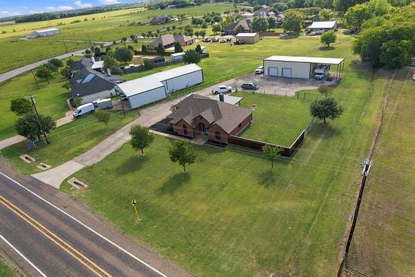 1.75 Acres of Land with Home for Sale in Palmer, Texas