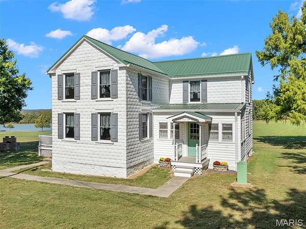 75 Acres of Land with Home for Sale in Leslie, Missouri
