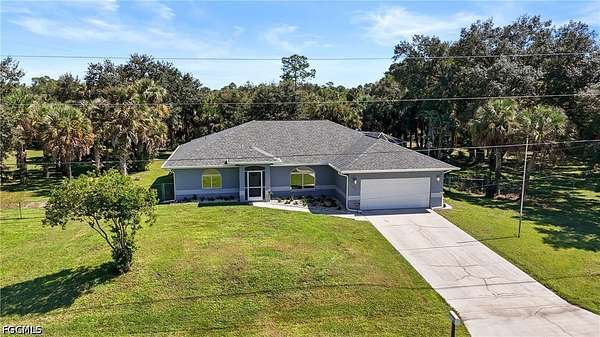 1.5 Acres of Land with Home for Sale in Lehigh Acres, Florida