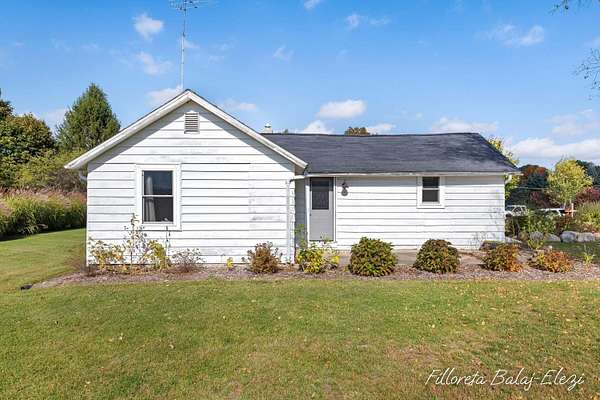 2 Acres of Land with Home for Sale in Cedar Springs, Michigan