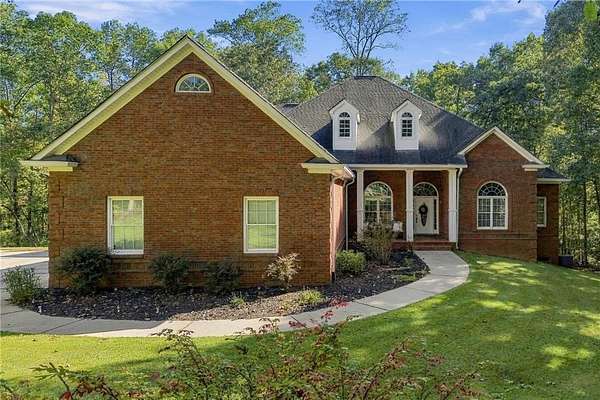 3.26 Acres of Land with Home for Sale in Ball Ground, Georgia