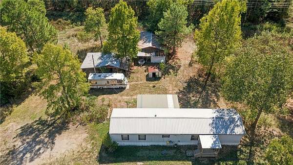 5.64 Acres of Land with Home for Sale in New Blaine, Arkansas