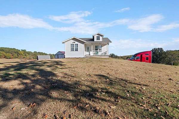 25.4 Acres of Land with Home for Sale in Ava, Missouri