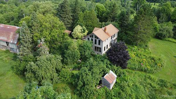 19.7 Acres of Land with Home for Sale in Eben Junction, Michigan