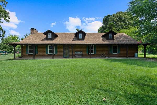 5.18 Acres of Land with Home for Sale in Marshall, Texas
