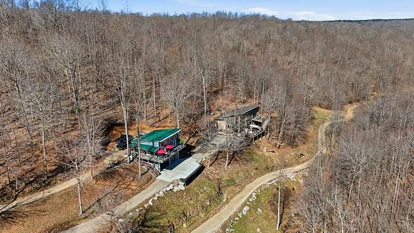 25 Acres of Land with Home for Sale in Linden, Tennessee
