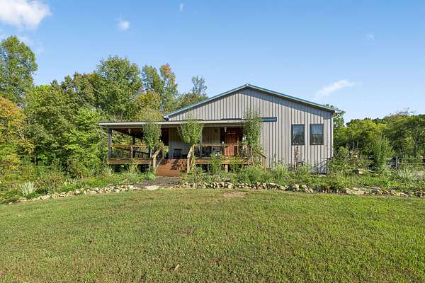 10.2 Acres of Land with Home for Sale in Hurricane Mills, Tennessee