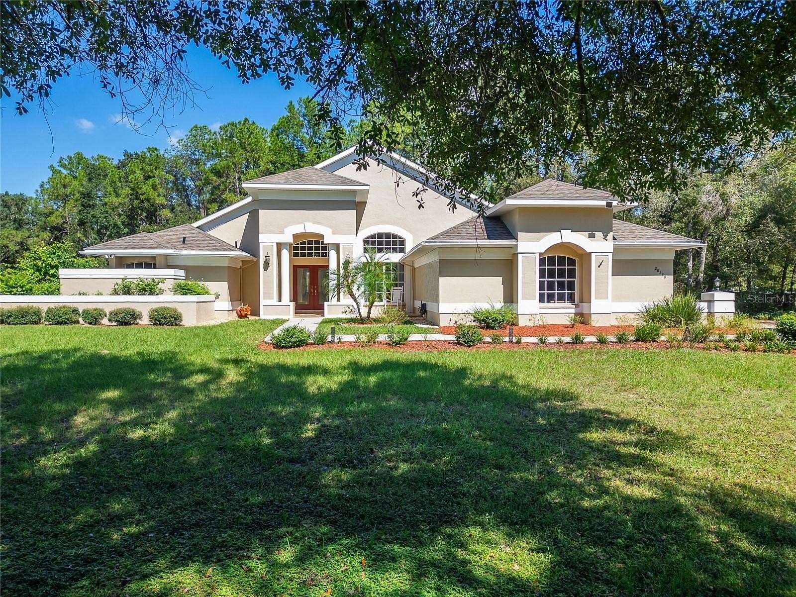 1.52 Acres of Land with Home for Sale in Wesley Chapel, Florida