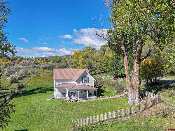 1.5 Acres of Land with Home for Sale in Hotchkiss, Colorado