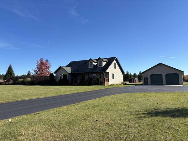 10 Acres of Land with Home for Sale in Rogers City, Michigan