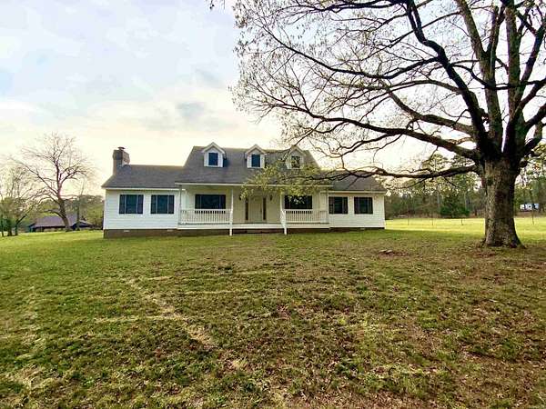 18 Acres of Land with Home for Sale in Tumbling Shoals, Arkansas
