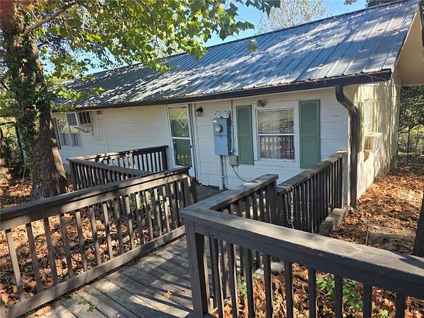 3.22 Acres of Land with Home for Sale in Gravette, Arkansas
