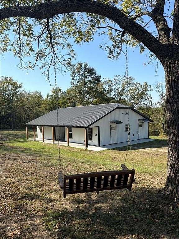 9.83 Acres of Land with Home for Sale in Kingsville, Missouri