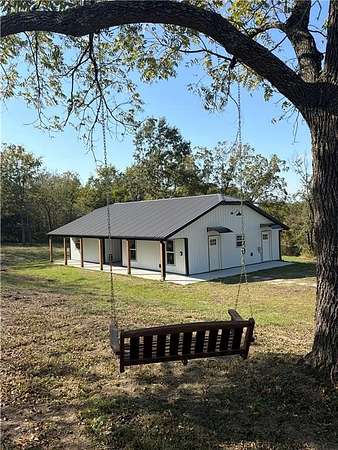 9.83 Acres of Land with Home for Sale in Kingsville, Missouri