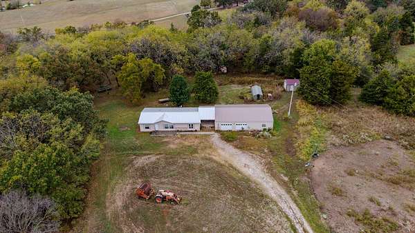 6.2 Acres of Land with Home for Sale in Goodson, Missouri