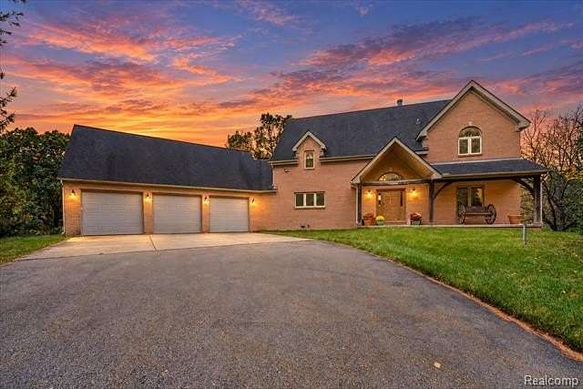 10 Acres of Land with Home for Sale in Groveland Township, Michigan