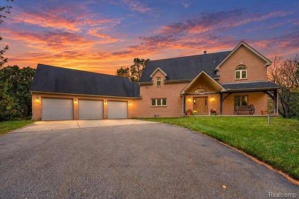 10 Acres of Land with Home for Sale in Groveland Township, Michigan