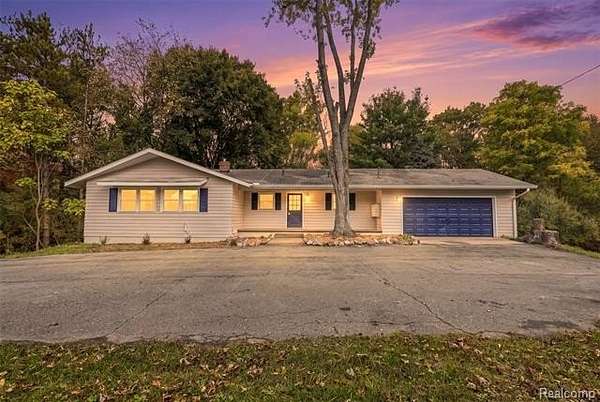 1.5 Acres of Land with Home for Sale in Highland Township, Michigan