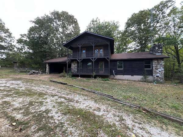8.69 Acres of Land with Home for Sale in Ash Flat, Arkansas