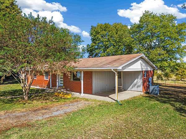 1.5 Acres of Land with Home for Sale in Quitman, Arkansas