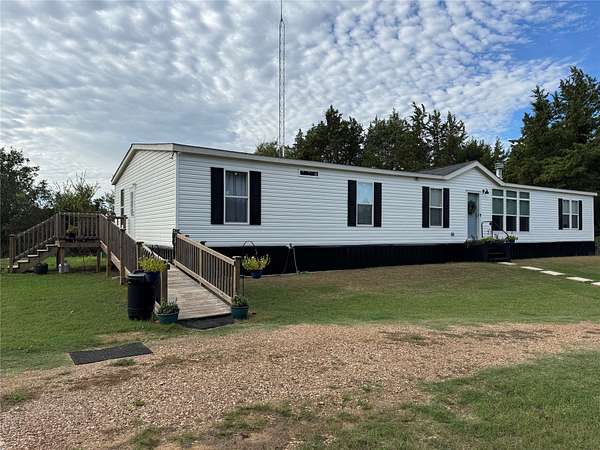 4.74 Acres of Land with Home for Sale in Bells, Texas