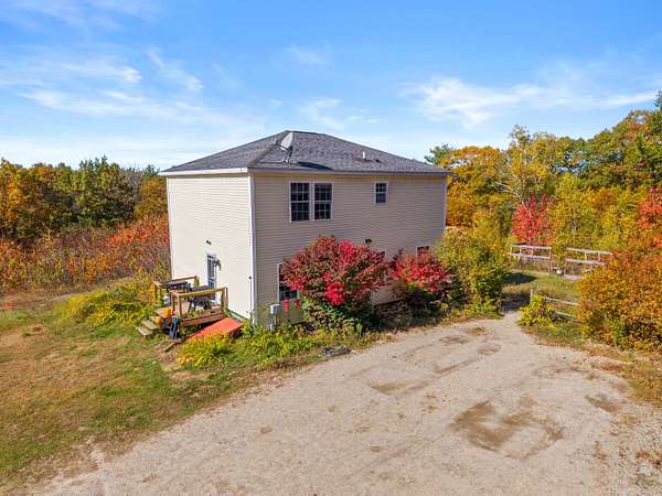 5.56 Acres of Land with Home for Sale in Poland, Maine