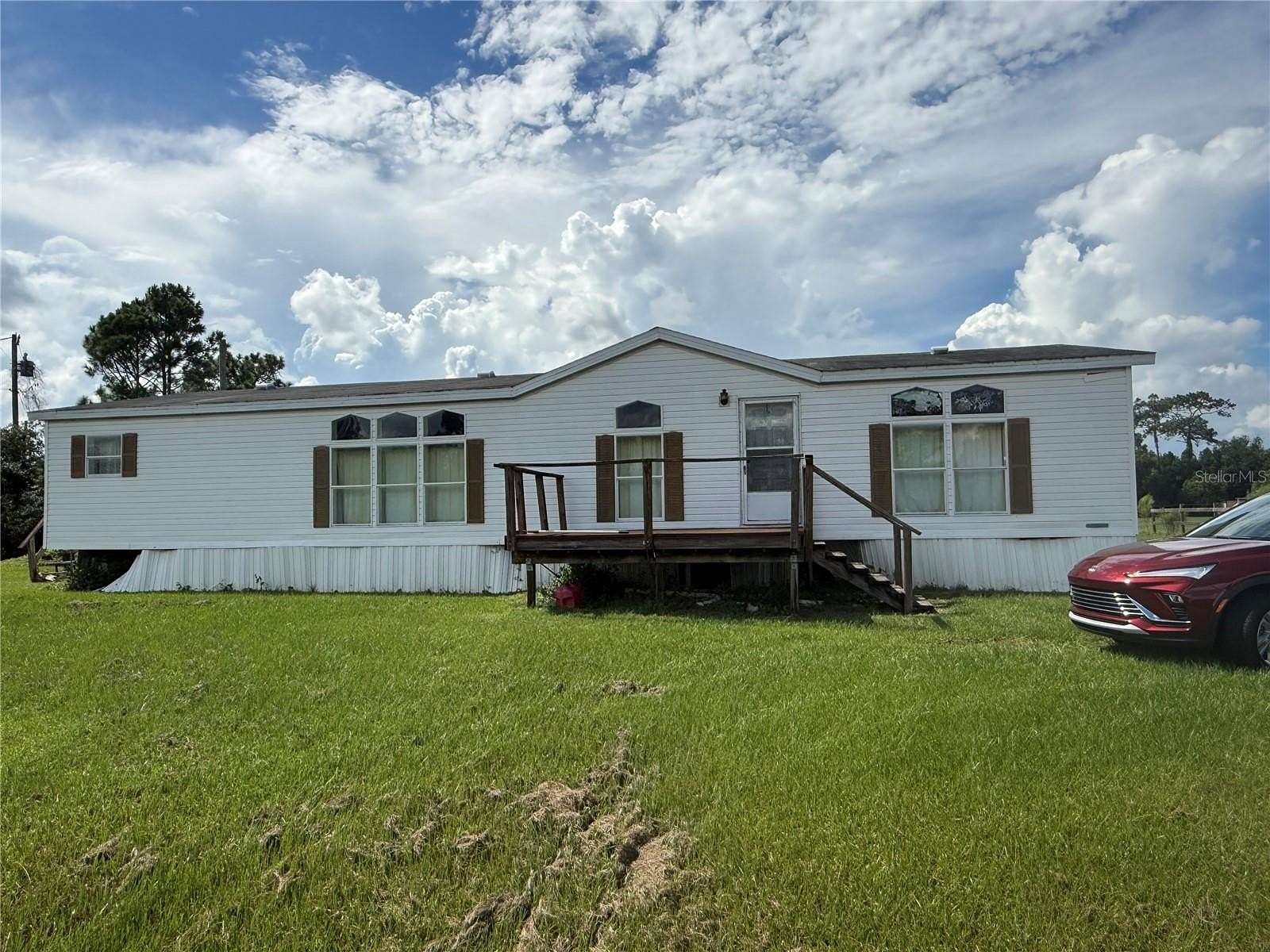 2.43 Acres of Land with Home for Sale in St. Cloud, Florida