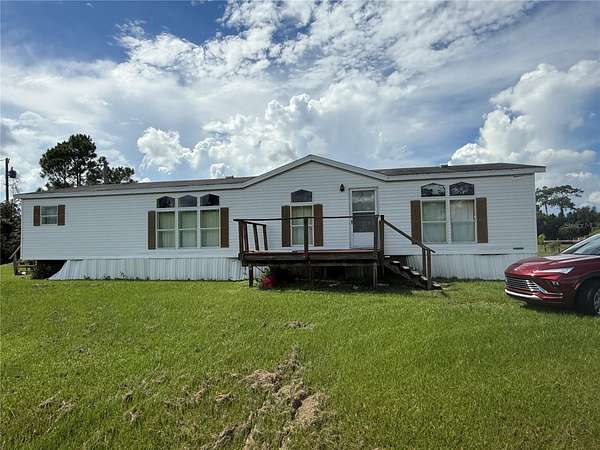 2.43 Acres of Land with Home for Sale in St. Cloud, Florida