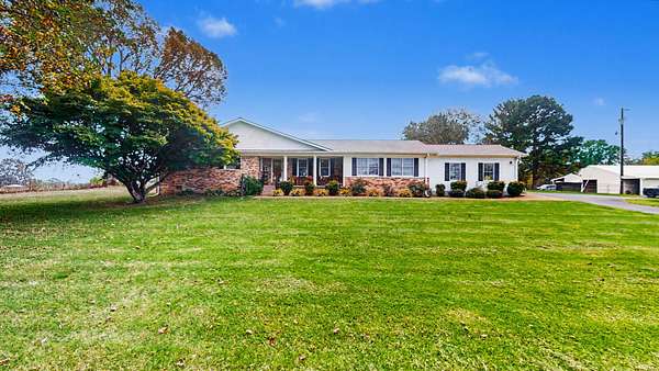 15 Acres of Land with Home for Sale in Paris, Tennessee