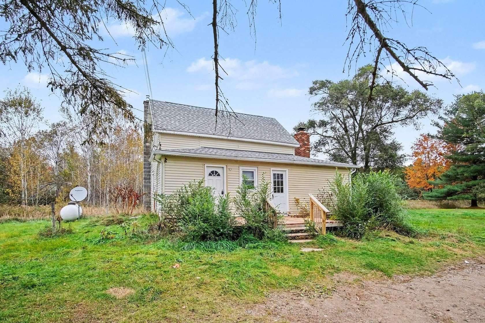 3 Acres of Land with Home for Sale in Orleans, Michigan