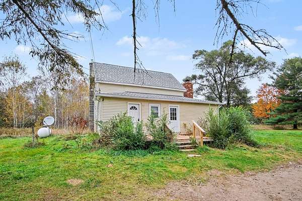 3 Acres of Land with Home for Sale in Orleans, Michigan