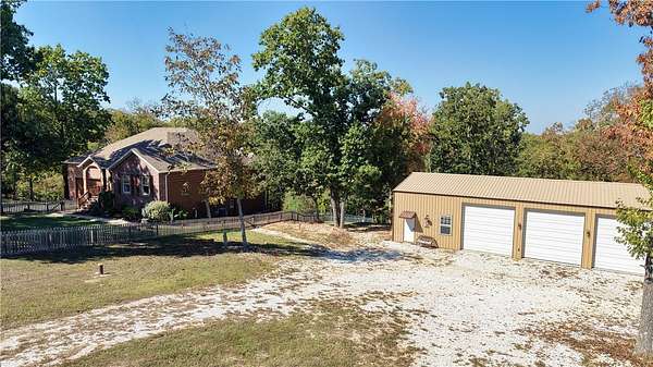 2.56 Acres of Land with Home for Sale in Rogers, Arkansas