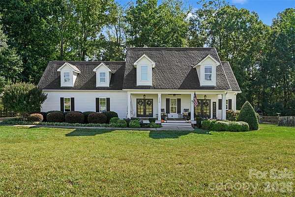 6 Acres of Land with Home for Sale in Huntersville, North Carolina