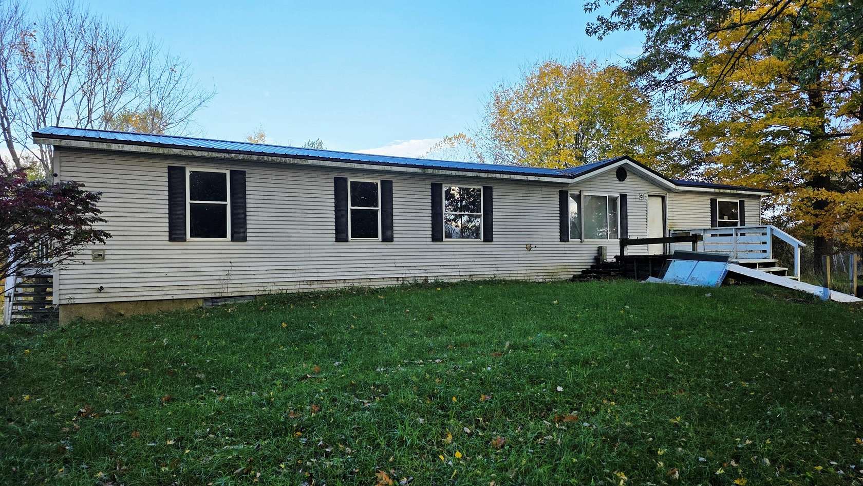 4 Acres of Land with Home for Sale in Remus, Michigan